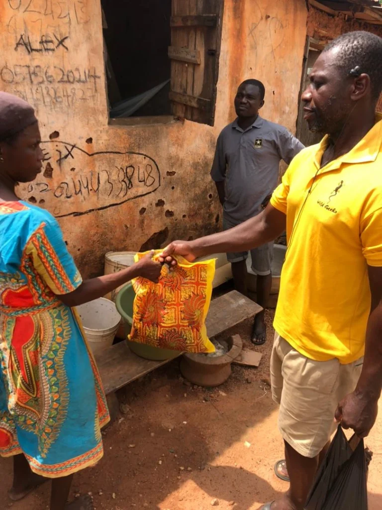 Golden Youth Foundation representative speaking with a community member during a structured outreach visit.