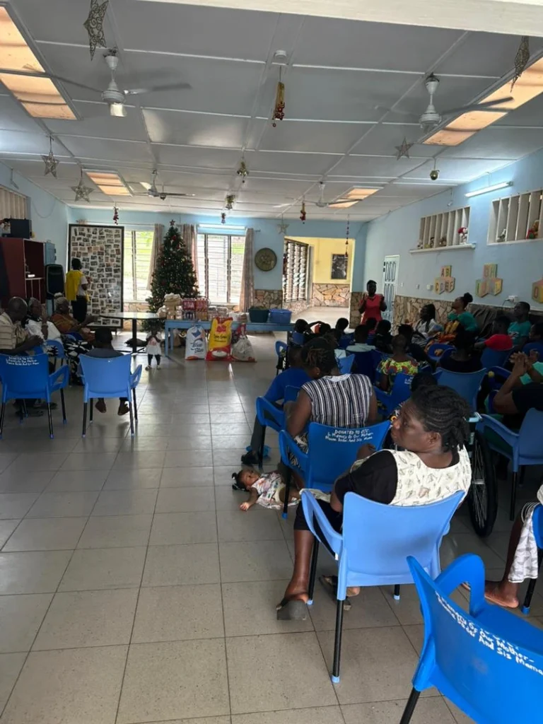 Community members seated during a structured educational session organized by Golden Youth Foundation.