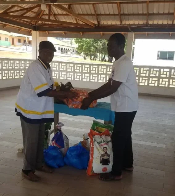 Foundation team member coordinating structured program support activities with beneficiaries.